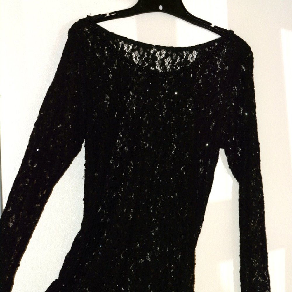 Lace and sequins with pallette trim on hem and